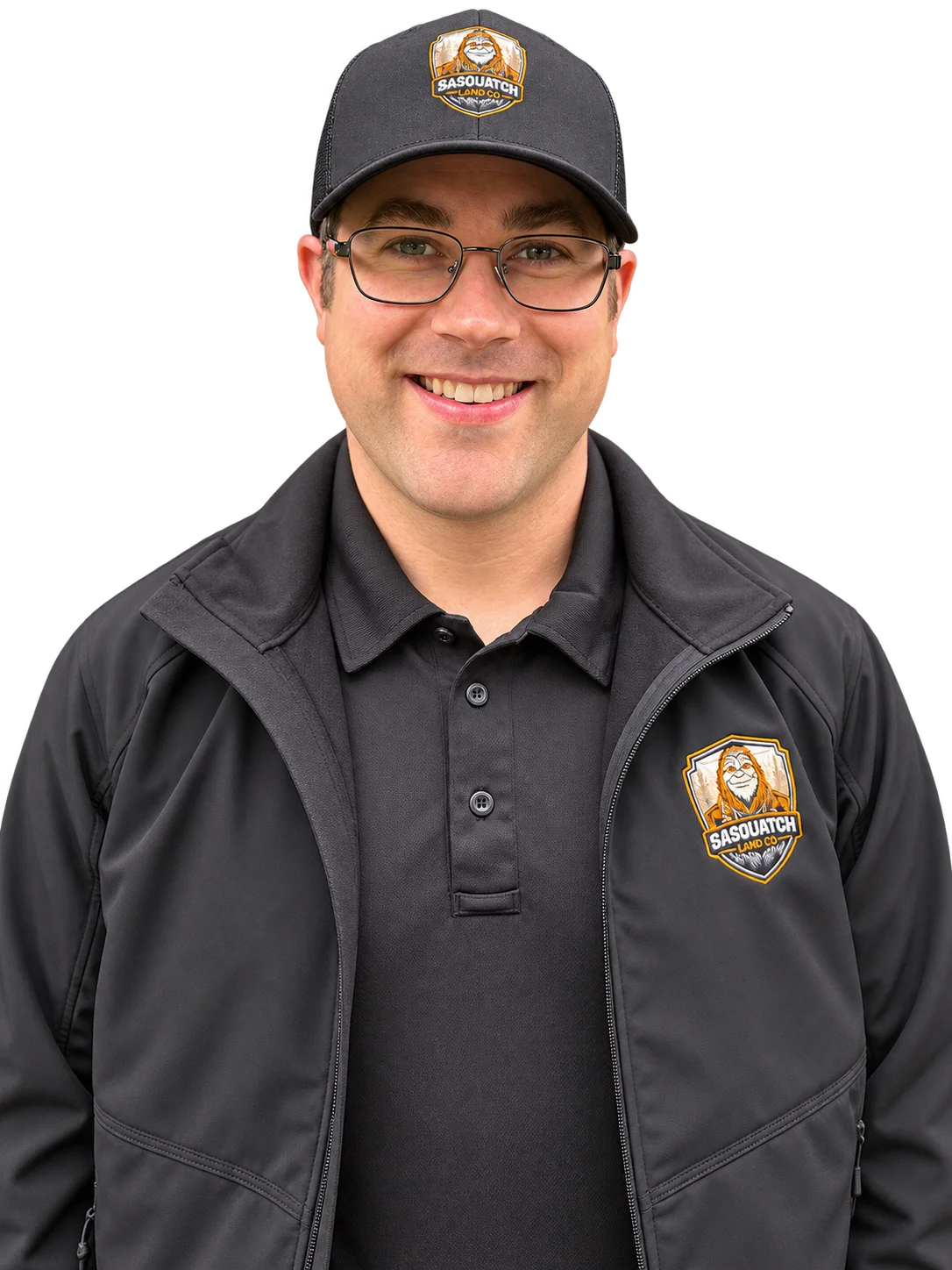 Eric, forestry mulching operator for Sasquatch Land Co., in a company cap and jacket